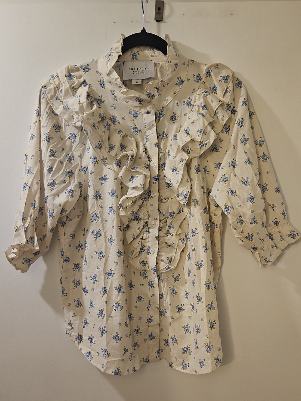 The Shirt by Rochelle Behrens Cream Button-Down Blouse with Blue Floral Ruffles